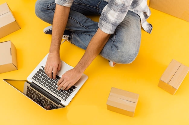 Delivery man with laptop and packages